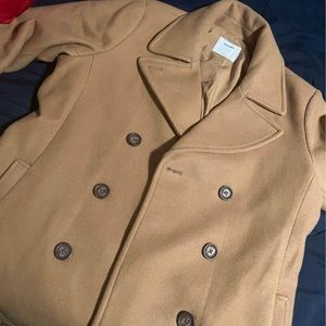A tan suit jacket from old navy